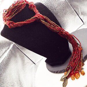 VINTAGE RUBY RED GLASS SEED BEAD W/ DANGLING LEAVES 50" L. SAUTOIRE NECKLACE 57